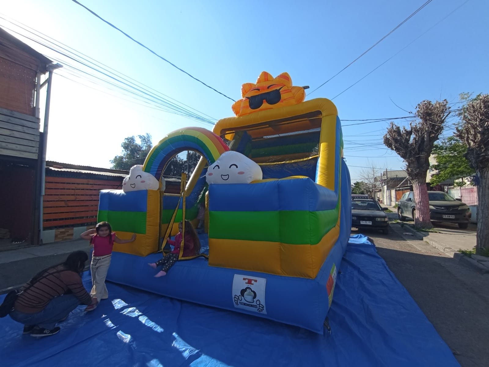 Niños en tobogán Summer